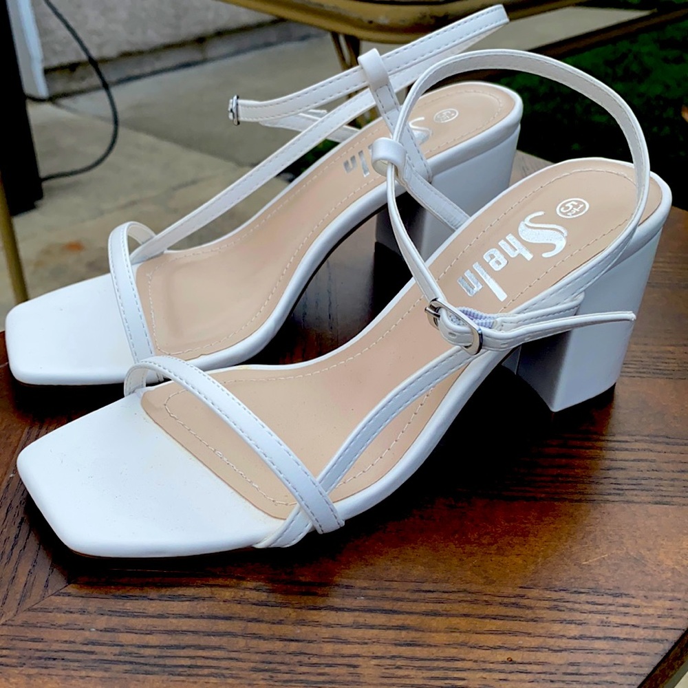 Size 5.5, white block heels, never worn.
